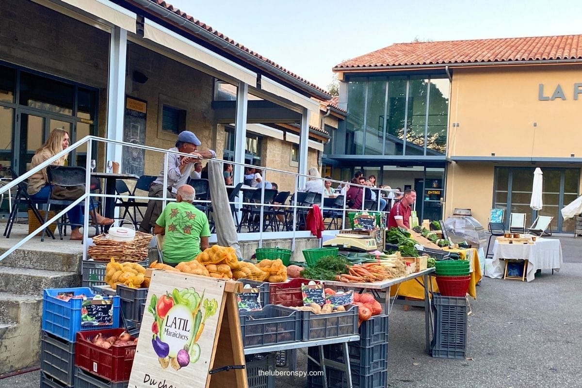 Fresh vegetables and local produce displayed at the Lourmarin farmers market.